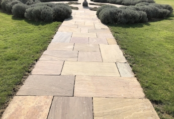 Long pathway patio after it is jet washed 